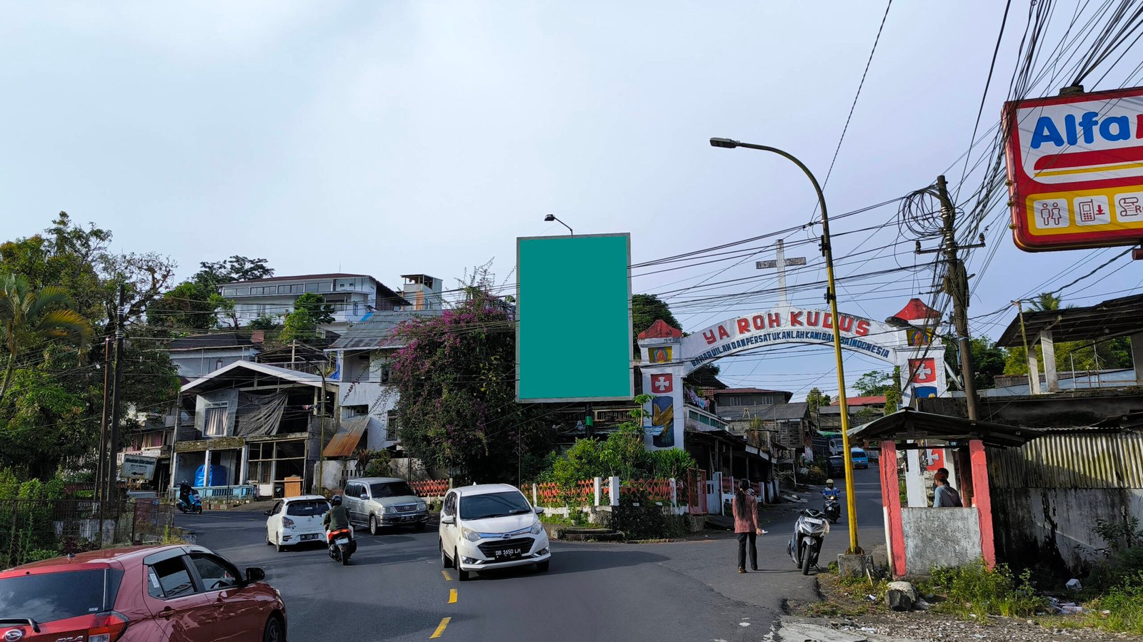 Depan Alfamart & GOR Arena Kinilow